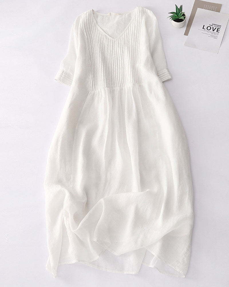 Elegant linen dress with sophisticated pleated details –Clara