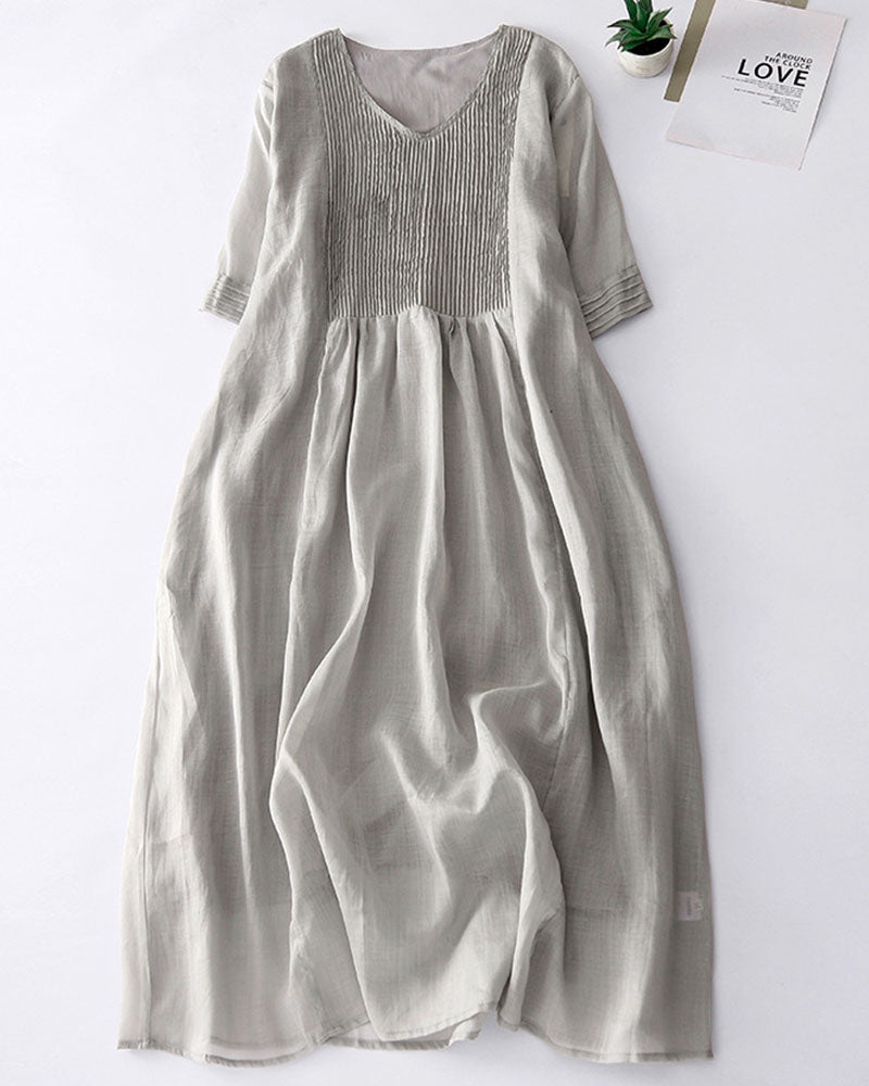 Elegant linen dress with sophisticated pleated details –Clara