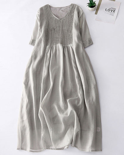 Elegant linen dress with sophisticated pleated details –Clara