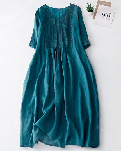 Elegant linen dress with sophisticated pleated details –Clara