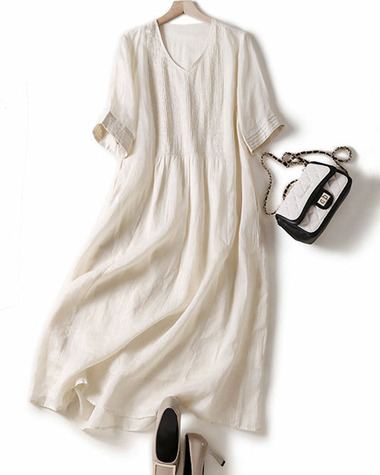 Elegant linen dress with sophisticated pleated details –Clara