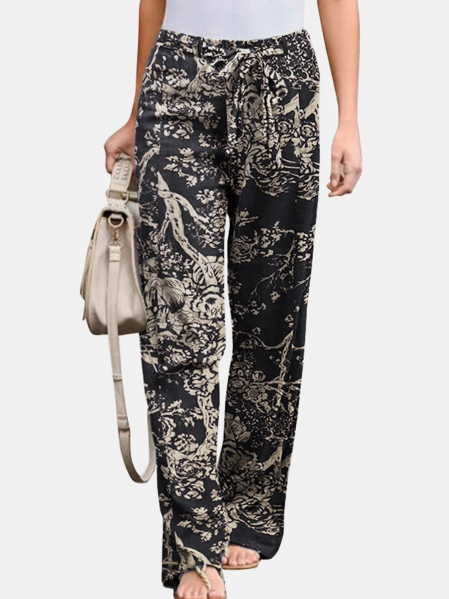 Elina - Loose linen trousers with a natural motif for women